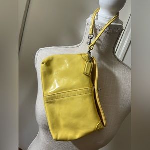COACH Yellow Wristlet